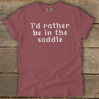 Rose t-shirt with white text that reads "I'd rather be in the saddle".