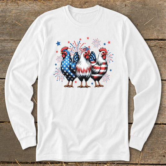 Three patriotic chickens with fireworks on a white long-sleeve shirt.