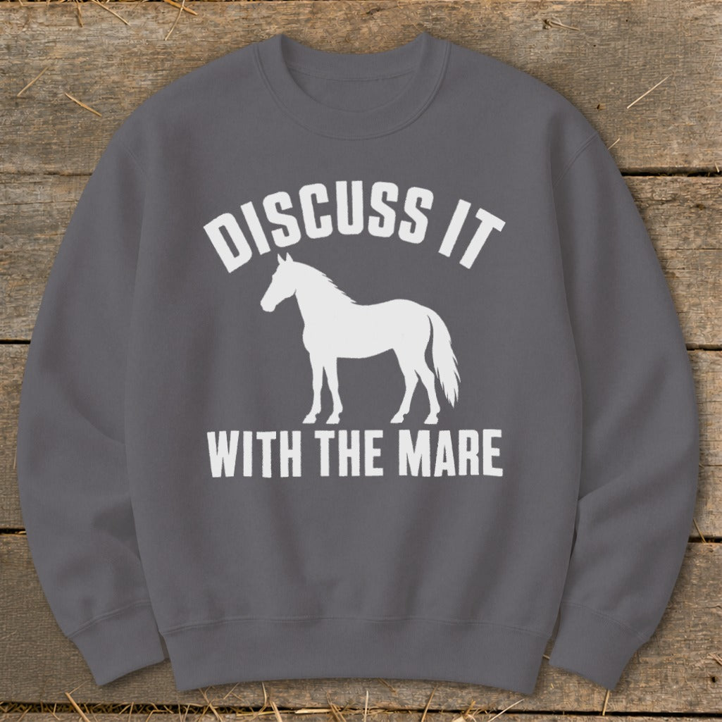 Grey sweatshirt with white text "DISCUSS IT" above a horse silhouette and "WITH THE MARE" below.