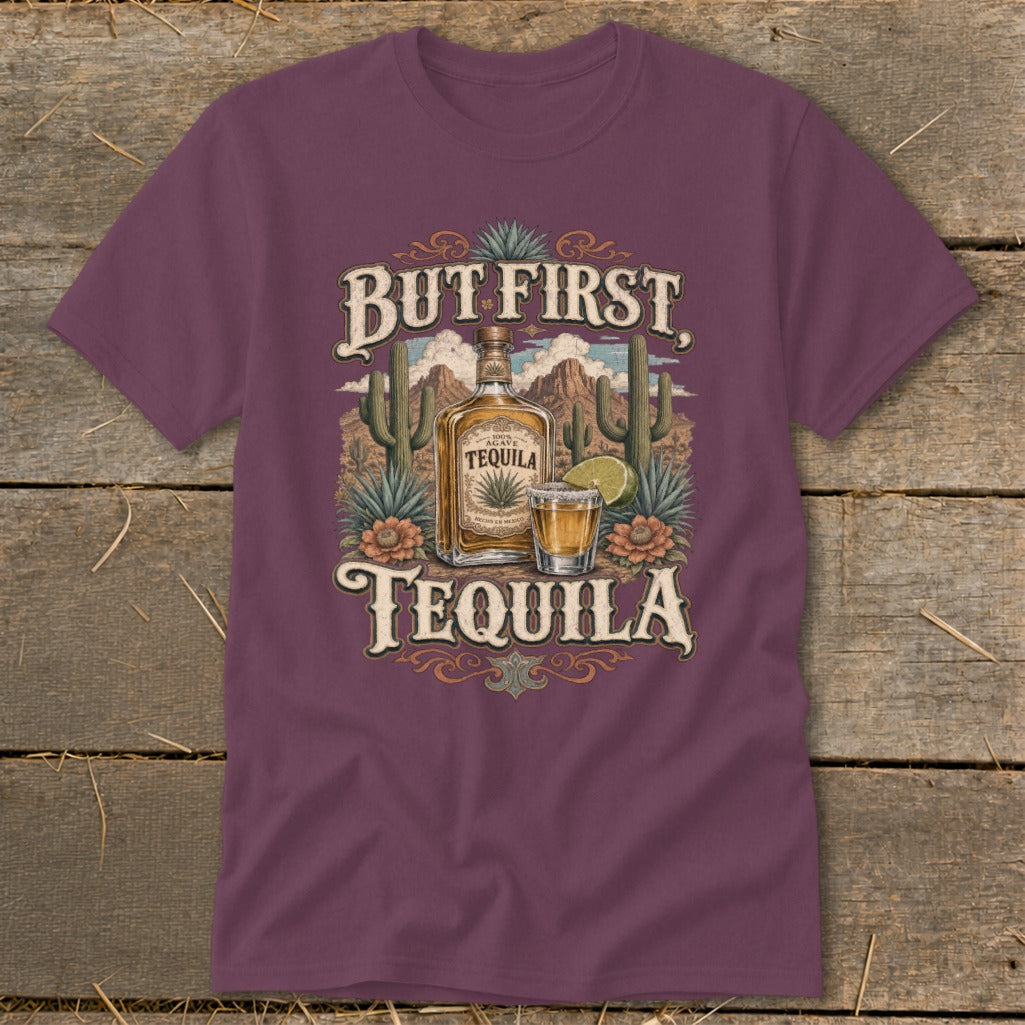 Maroon t-shirt with "But First Tequila" text and desert scene graphic.