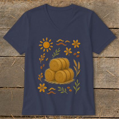 Navy v-neck t-shirt with stacked hay bales, sun, flowers, and leaves graphic.