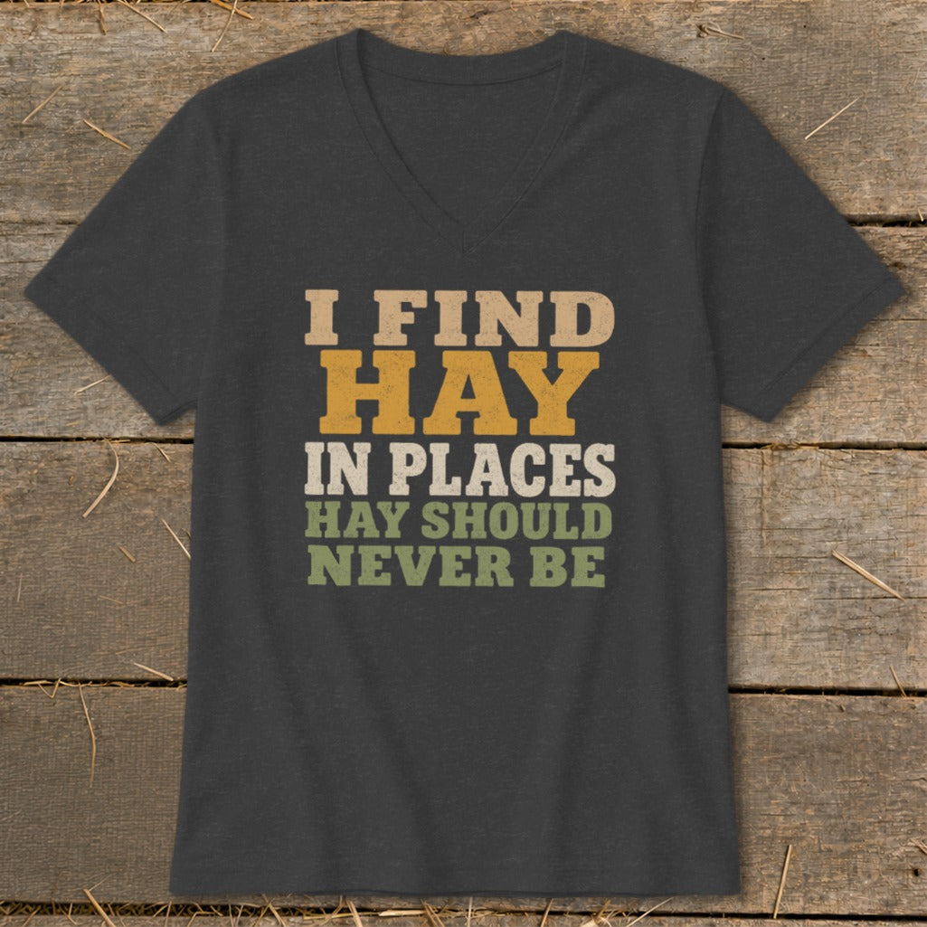 Dark grey t-shirt with text "I FIND HAY IN PLACES HAY SHOULD NEVER BE".