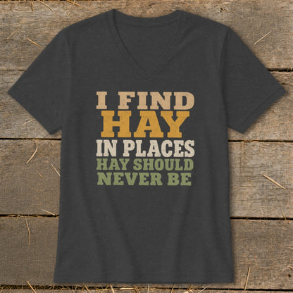 Dark grey t-shirt with text "I FIND HAY IN PLACES HAY SHOULD NEVER BE".
