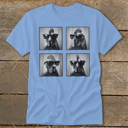Light blue t-shirt featuring a graphic of four black-and-white roosters wearing sunglasses.