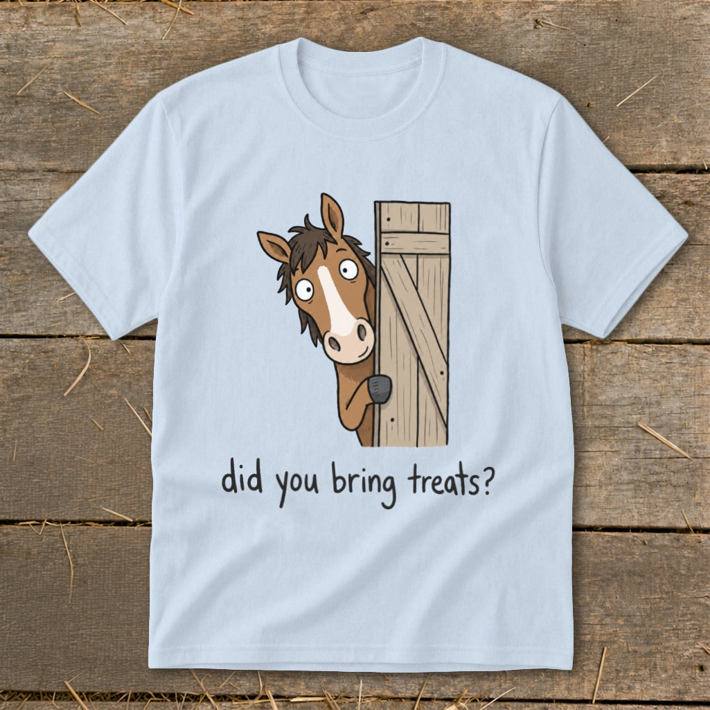 Light blue t-shirt with a cartoon horse peeking from a wooden door and the text "did you bring treats?".