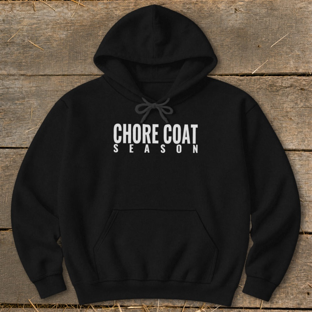 Black hoodie with white text "CHORE COAT SEASON" printed on the chest.