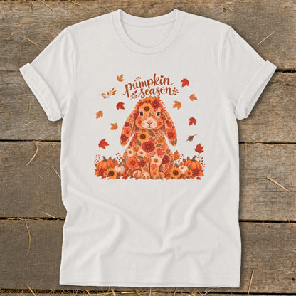 White t-shirt with a floral bunny, pumpkins, and autumn leaves, reading "pumpkin season".