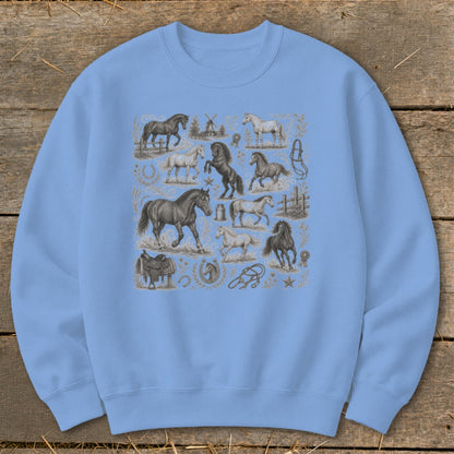 Light blue sweatshirt with a collage of vintage horse illustrations and equestrian elements.