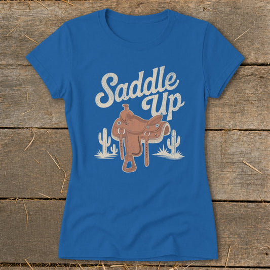 Blue t-shirt with "Saddle Up" text and a cowboy saddle illustration.