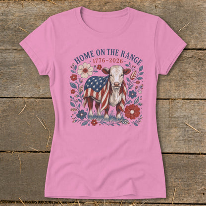 Cow wearing an American flag with text "HOME ON THE RANGE 1776-2026".