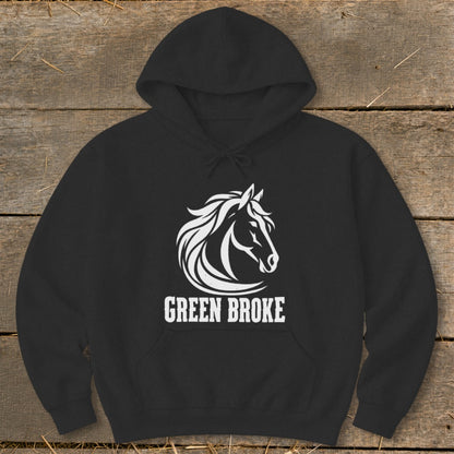 A black hooded sweatshirt with a white graphic of a horse head and the text GREEN BROKE.