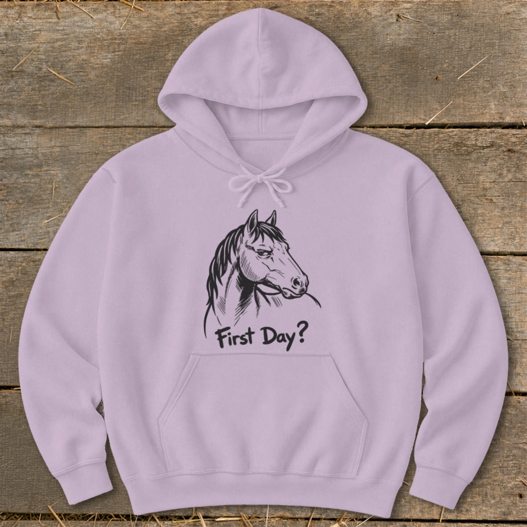 Lilac hoodie with black line drawing of a horse's head and text "First Day?".