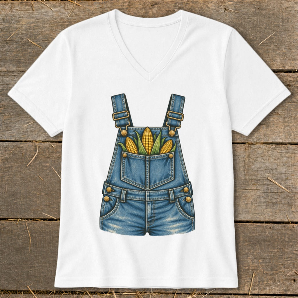 White t-shirt with a denim overalls graphic featuring three ears of corn in the pocket.