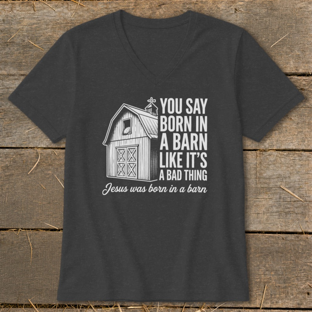 Dark t-shirt with a barn graphic and text about Jesus being born in a barn.