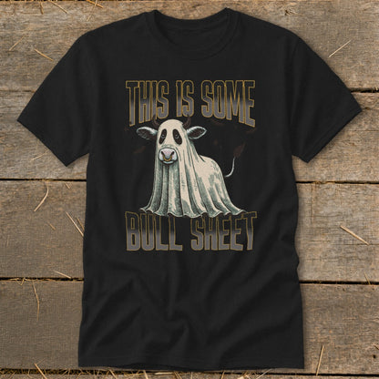 Black t-shirt with a cow in a ghost costume and text "THIS IS SOME BULL SHEET".