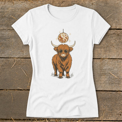 Highland cow with sunglasses and disco ball graphic on a white t-shirt.