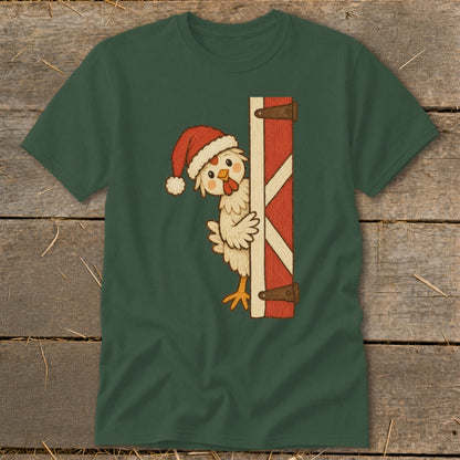 Chicken wearing a Santa hat peeking around a red barn door.