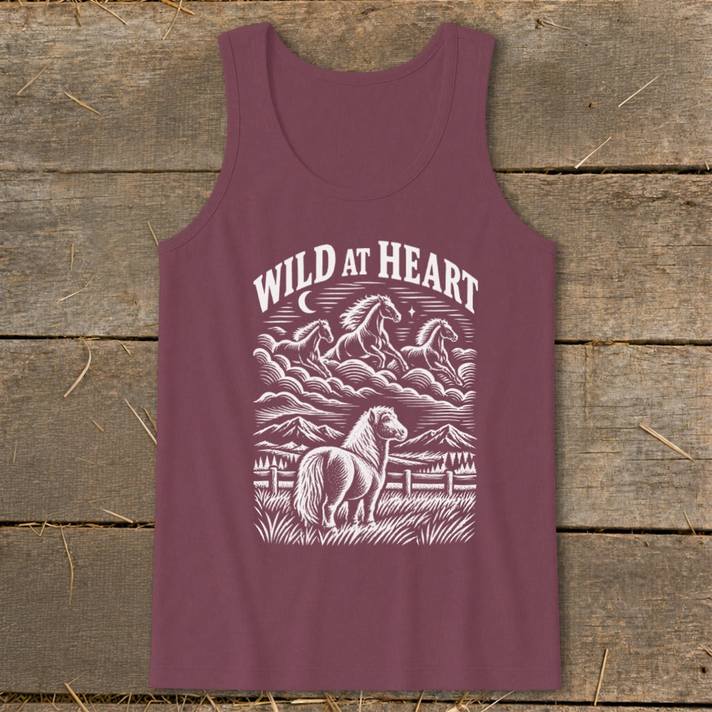 Maroon tank top with white graphic "WILD AT HEART" and horses in clouds and field.