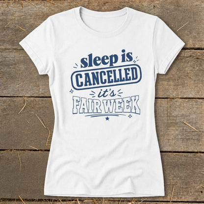 White t-shirt with blue text: "sleep is CANCELLED it's FAIR WEEK".