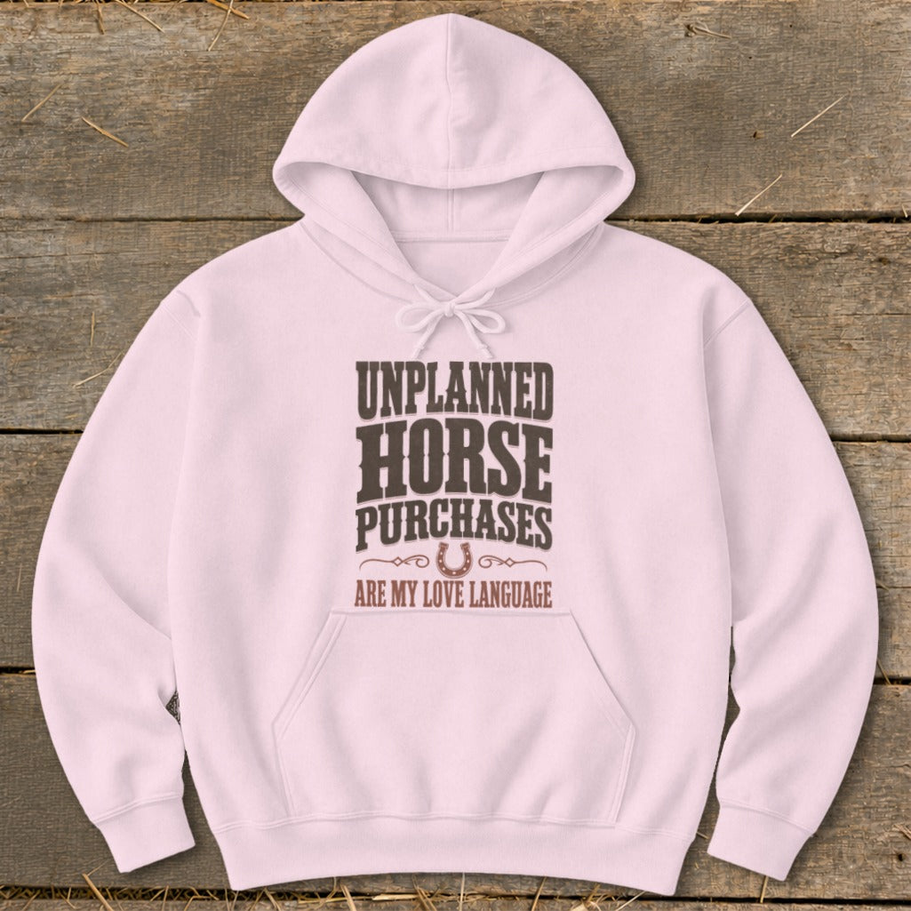 Pink hoodie with text "Unplanned Horse Purchases Are My Love Language."