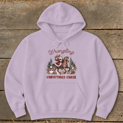 Light purple hoodie with "Wrangling Christmas Cheer" text and Santa on a horse graphic.