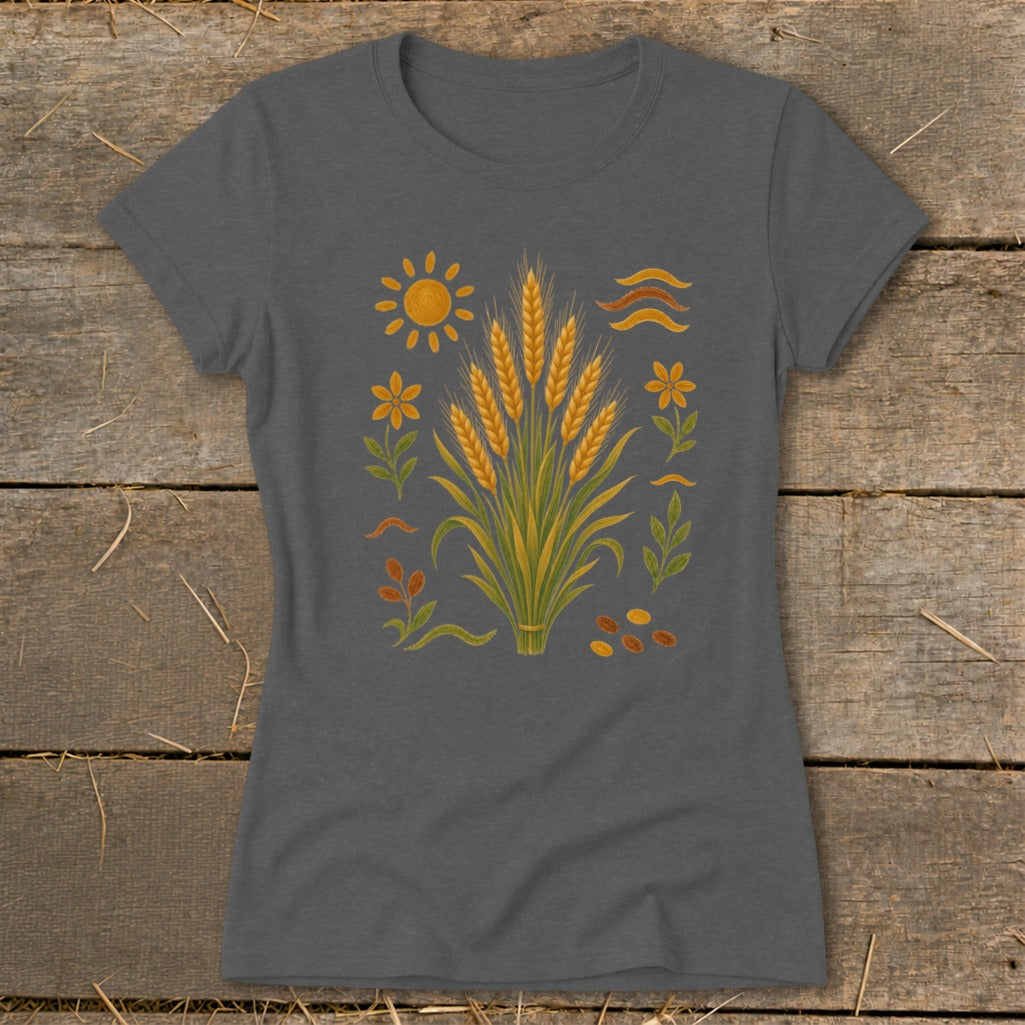 Gray t-shirt with an illustration of wheat stalks, sun, flowers, leaves, and seeds.