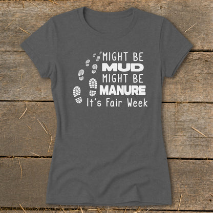 Dark grey t-shirt with white text: "Might Be Mud, Might Be Manure. It's Fair Week."