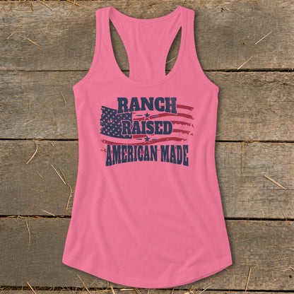 Pink racerback tank top with "Ranch Raised American Made" text and distressed US flag.