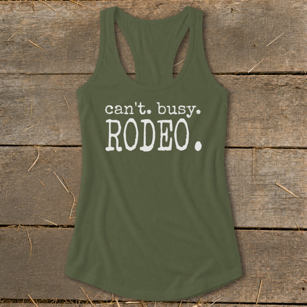 Olive green tank top with white text that says "can't. busy. RODEO."