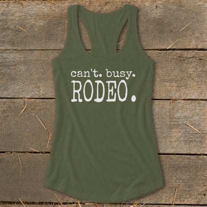 Olive green tank top with white text that says "can't. busy. RODEO."