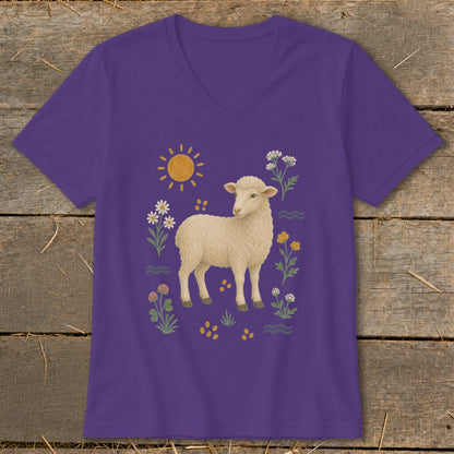 Purple t-shirt with a lamb and flowers graphic.