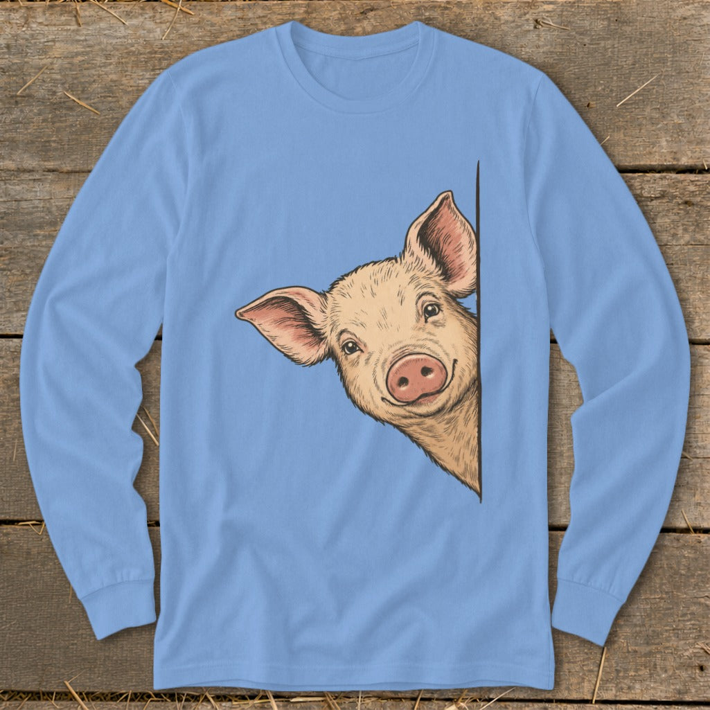 Drawing of a peeking pig on a light blue long-sleeve shirt.