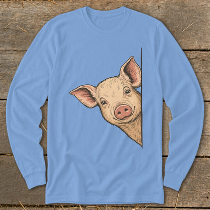 Drawing of a peeking pig on a light blue long-sleeve shirt.