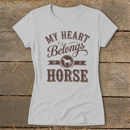 Light grey t-shirt with brown text and horse graphic that reads "My Heart Belongs To A Horse."