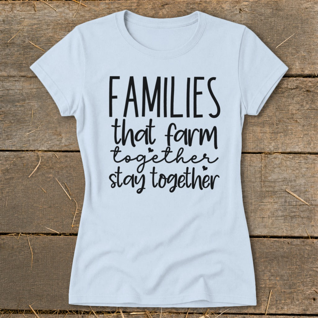 Light blue t-shirt with "Families that farm together stay together" text.