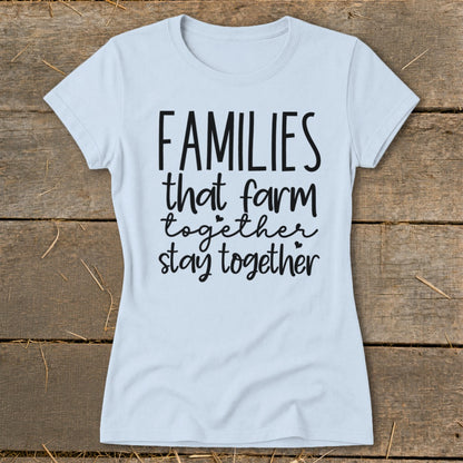 Light blue t-shirt with "Families that farm together stay together" text.