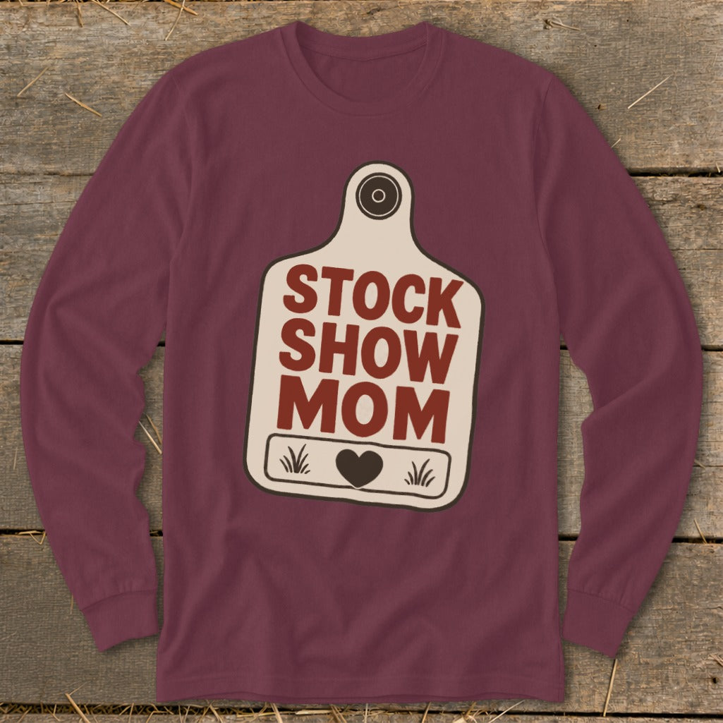 Maroon long-sleeve shirt with a cream-colored tag graphic that reads "STOCK SHOW MOM".