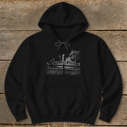 Black hoodie with a farm scene graphic featuring a cat, barn, windmill, and tree.