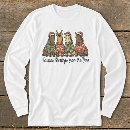 Four horses in Christmas sweaters and Santa hats with text "Seasons Greetings from the Herd."