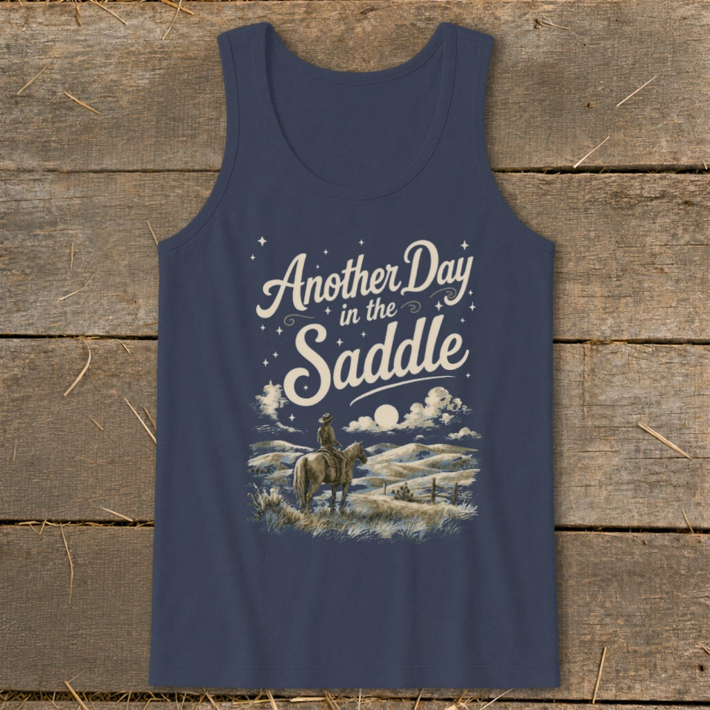 Dark blue tank top with "Another Day in the Saddle" text and cowboy on horseback scene.