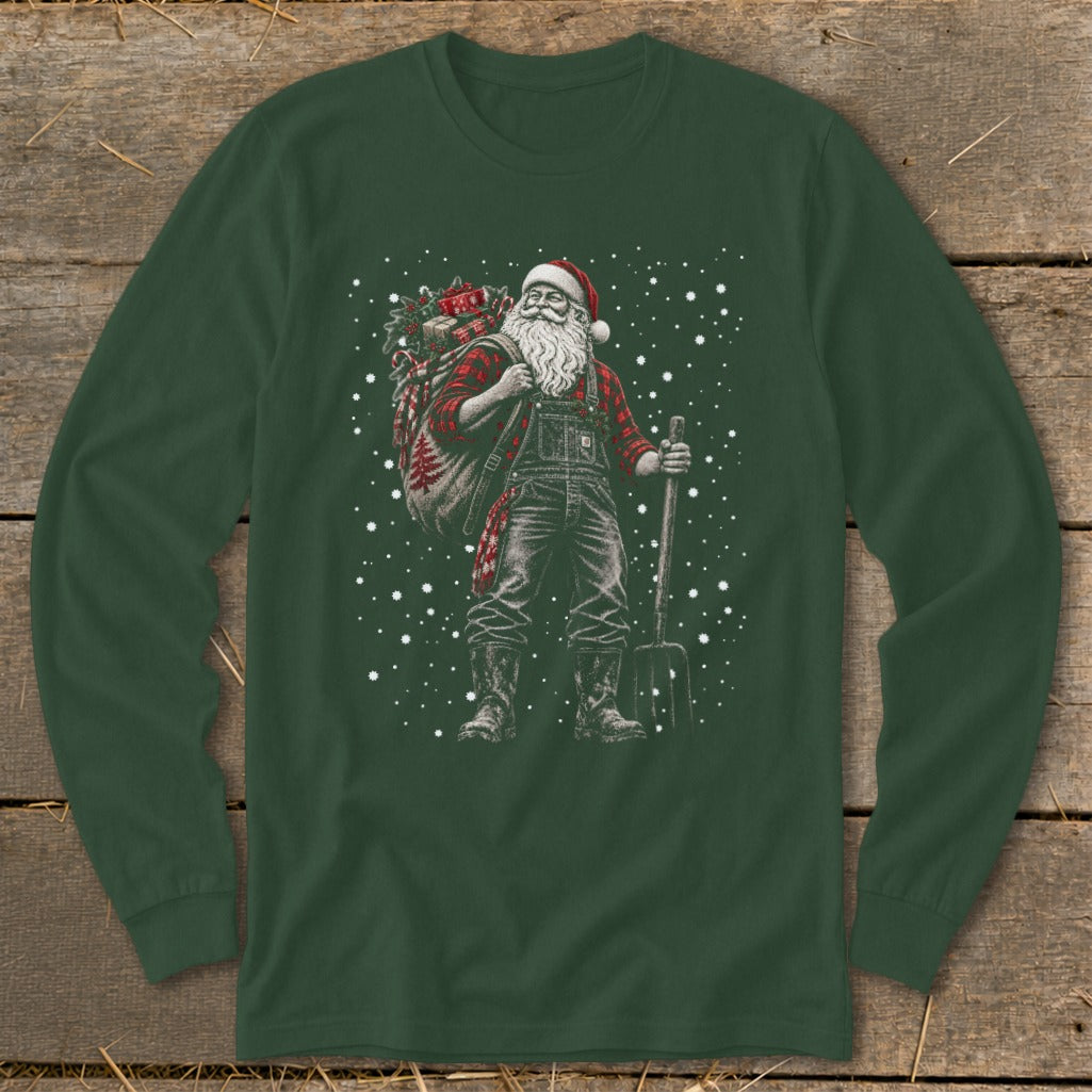 Santa Claus wearing overalls, flannel shirt, and boots, carrying a sack of gifts and a pitchfork.