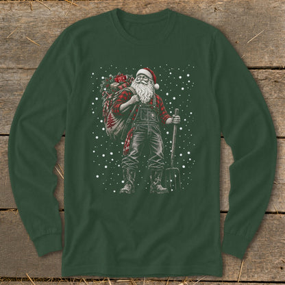 Santa Claus wearing overalls, flannel shirt, and boots, carrying a sack of gifts and a pitchfork.