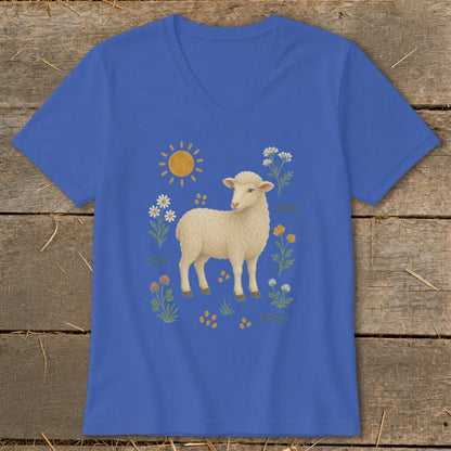 Blue v-neck t-shirt with a graphic of a lamb surrounded by flowers and a sun.
