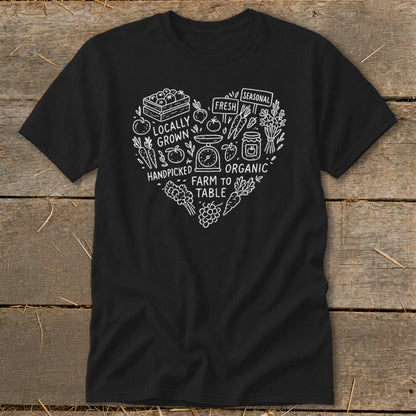 Black t-shirt with white heart design featuring farm-fresh produce and text.