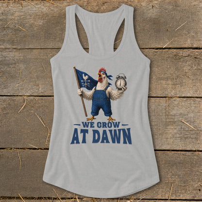 Chicken wearing overalls holding flag and alarm clock, text reads "We Grow At Dawn."
