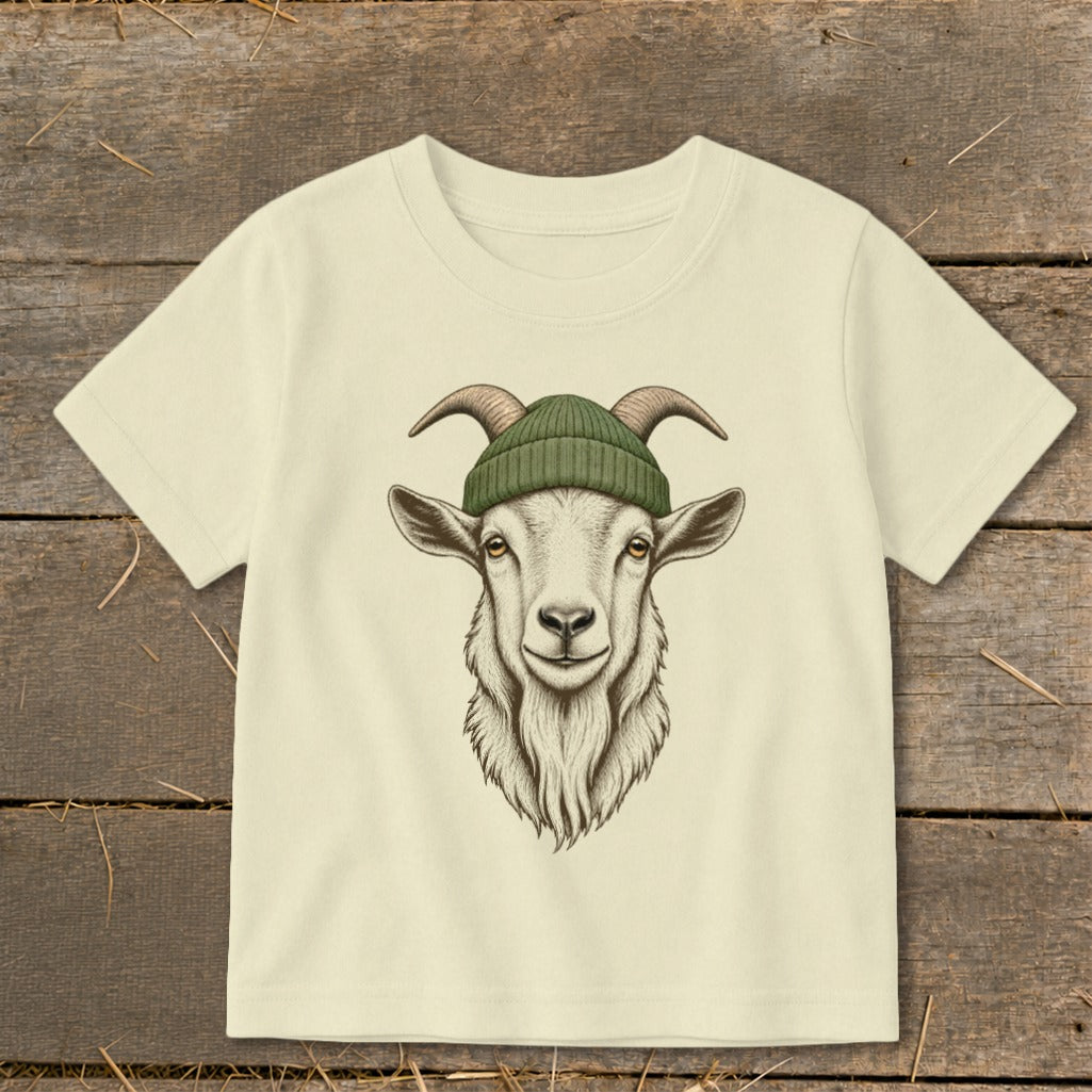 Cream t-shirt with a goat wearing a green beanie graphic on the front.