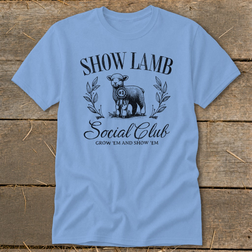 Light blue t-shirt with black graphic of a show lamb and text.