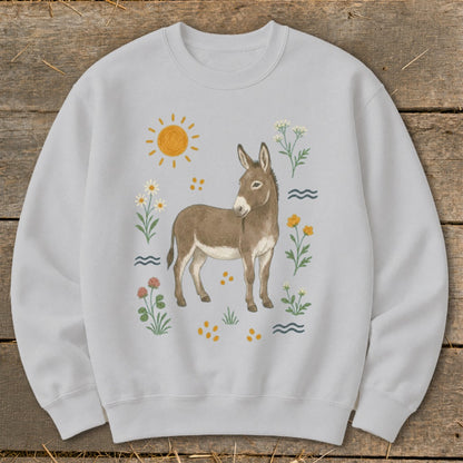 Gray sweatshirt with a brown donkey illustration surrounded by flowers, sun, and dots.