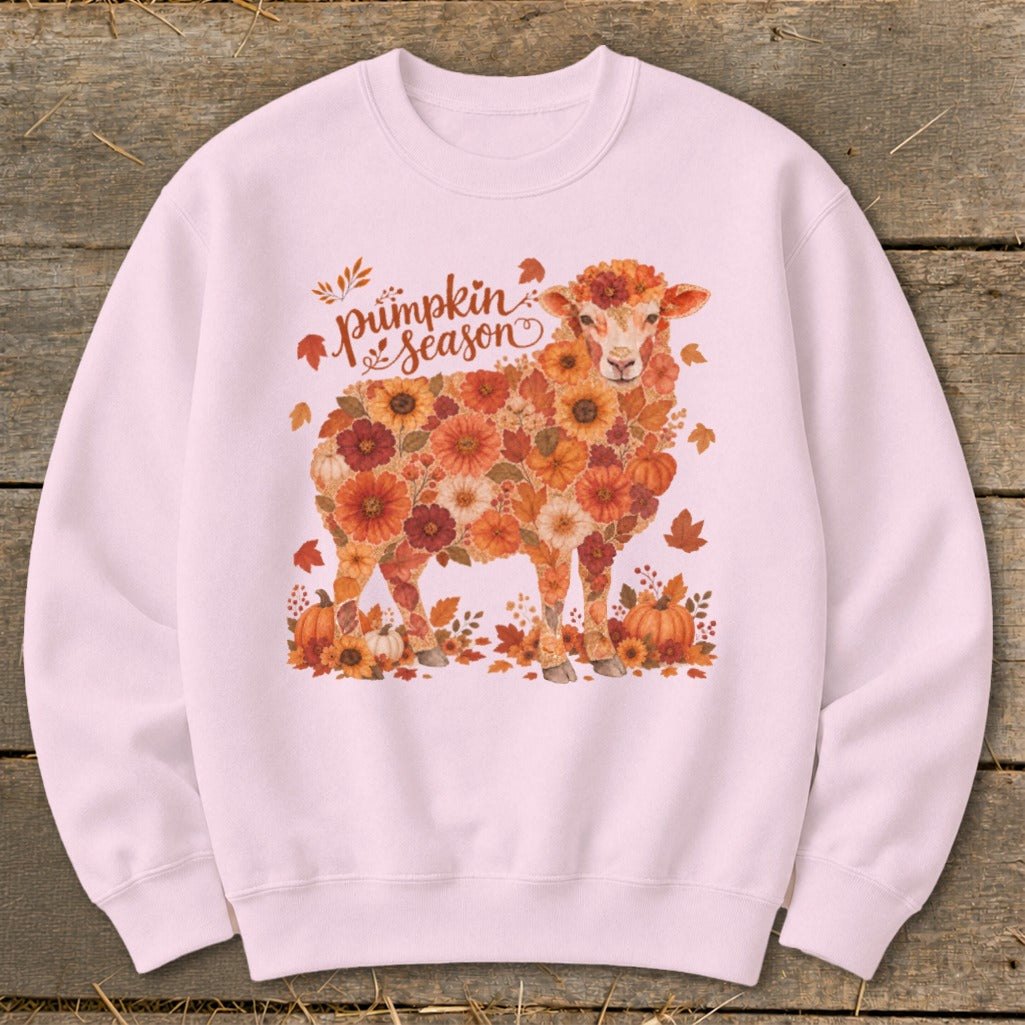 Light pink sweatshirt with floral sheep graphic and "pumpkin season" text.