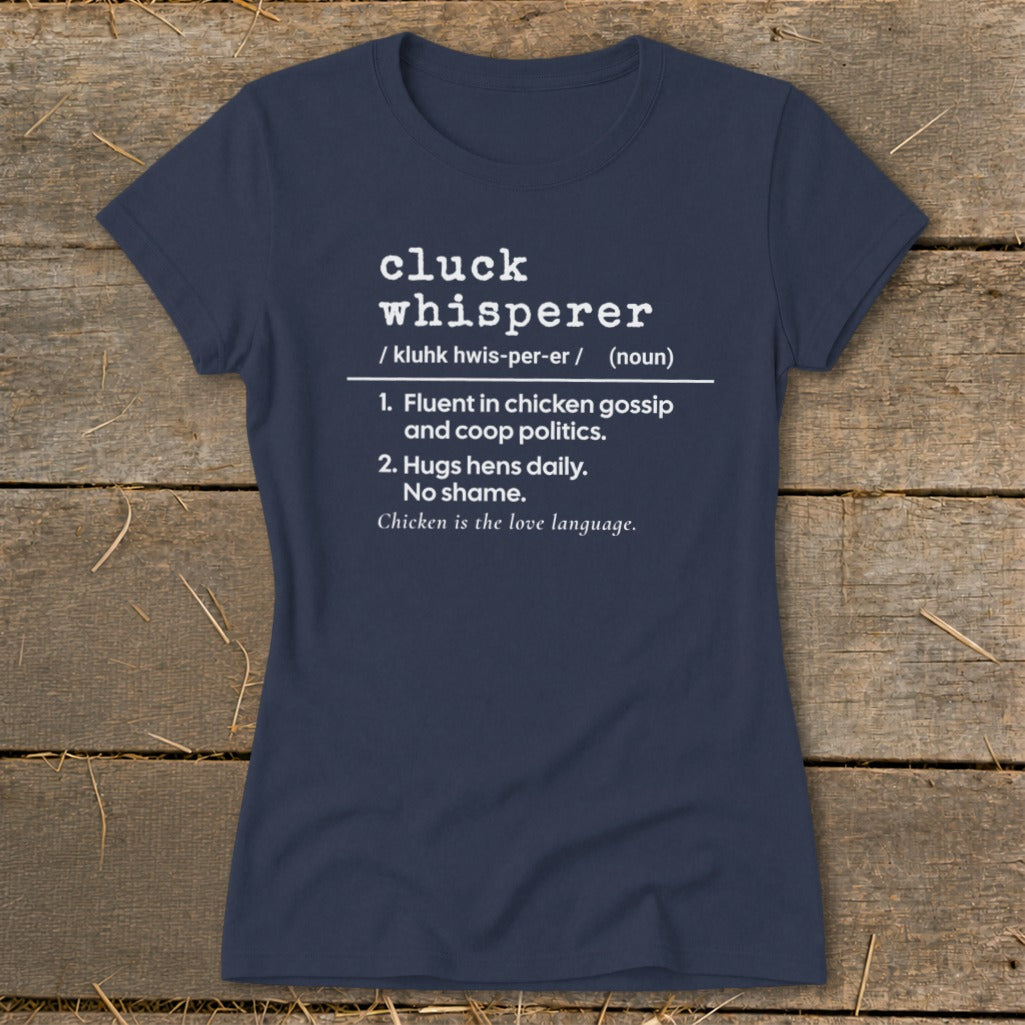 Navy t-shirt with "cluck whisperer" definition in white text.